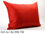 Inviting Red bright pillow isolated on white background. Generate Ai. Стоковое AI-изображение, AI-художник Иван Рябоконь / Фотобанк Лори