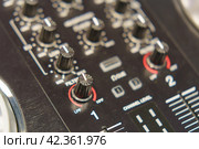 Photography of the modern premium stage musical mixed board / desk. Close frontal view of concert and studio sound and lights electronics equipment. Стоковое фото, фотограф YuryKara / Фотобанк Лори