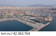 Aerial view of town and port in Marseille city with of sailboats and yachts. France. Стоковое видео, видеограф Яков Филимонов / Фотобанк Лори
