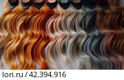 Wavy hair extensions in assorted colors for hair additions or color testing on white background. Стоковое AI-изображение, AI-художник Юрий Поздников / Фотобанк Лори