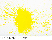 Image of yellow paint spots spilled on background of white paper. Стоковое фото, фотограф Яков Филимонов / Фотобанк Лори