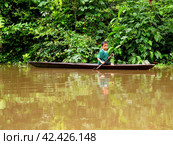 Amazon river, Peru - 12 May 2011: The boat in Amazon river in Peru, South America. Редакционное фото, фотограф Сергей Стрелков / Фотобанк Лори