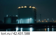 Huge oil refinery tank at night, ominous, detailed, dark, dim lighting, glowy, sinister ,    Generative AI. Стоковое AI-изображение, AI-художник Анна Кривицкая / Фотобанк Лори