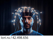 Man with brain electrodes futuristic helmet. Generate ai. Стоковое AI-изображение, AI-художник Иван Рябоконь / Фотобанк Лори
