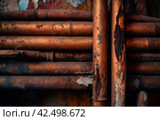 Stack of rusty orange pipes. Generate ai. Стоковое AI-изображение, AI-художник Иван Рябоконь / Фотобанк Лори