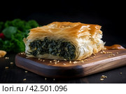 Spanakopita greek pastry dish. Generate Ai. Стоковое AI-изображение, AI-художник Иван Рябоконь / Фотобанк Лори