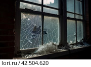 Damaged vandalized window glass. Generate ai. Стоковое AI-изображение, AI-художник Иван Рябоконь / Фотобанк Лори