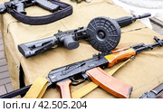 Russian Kalashnikov assault rifle with a drum magazine, AK-74 assault rifle. Стоковое фото, фотограф FotograFF / Фотобанк Лори
