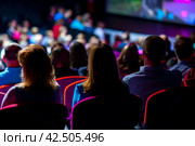 Audience engaged in a captivating live presentation. Стоковое AI-изображение, AI-художник Антон Гвоздиков / Фотобанк Лори