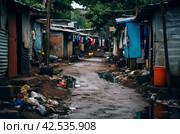 Disadvantaged people living in poverty background. Generate ai. Стоковое AI-изображение, AI-художник Иван Рябоконь / Фотобанк Лори
