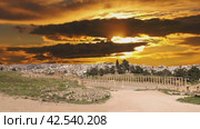 Forum (Oval Plaza) in Gerasa (Jerash), Jordan. Was built in the first century AD. Against the background of the sunset, 4K, time lapse (2024 год). Стоковое видео, видеограф Владимир Журавлев / Фотобанк Лори
