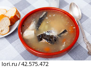 Salmon offal soup with vegetables - potatoes, carrots and parsley. Стоковое фото, фотограф Яков Филимонов / Фотобанк Лори