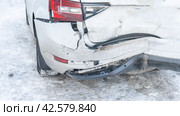 Wrecked car with rear close-up, A white car with a broken rear bumper after a traffic accident. Стоковое фото, фотограф Скрипачев Антон / Фотобанк Лори
