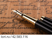fountain pen on paper with ink text. Стоковое фото, фотограф Александр Калугин / Фотобанк Лори