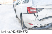 Wrecked car with rear close-up, A white car with a broken rear bumper after a traffic accident. Стоковое фото, фотограф Скрипачев Антон / Фотобанк Лори