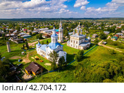Вид с высоты на комплекс церквей и колокольню в Лальске (аэросъемка 2023 года) Стоковое фото, фотограф Владислав Самошкин / Фотобанк Лори