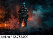 A firefighter in a fiery hearth is fighting the fire with a hose. Стоковое AI-изображение, AI-художник Ярославский Максим / Фотобанк Лори