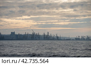 smoke after the explosion in the seaport war in Ukraine (2024 год). Стоковое фото, фотограф Артем Курутин / Фотобанк Лори