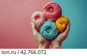 Person Holding a Ball of Yarn. Стоковое AI-изображение, AI-художник Юлия Гапеенко / Фотобанк Лори