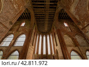 CHORIN, GERMANY - APRIL 01, 2024: Ruin of Chorin Abbey. Chorin Abbey (Kloster Chorin) is a former Cistercian abbey. An example of Gothic architecture. Founded in 1258. It was secularized in 1542. Редакционное фото, фотограф Sergey Kohl / Фотобанк Лори