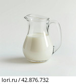 Fresh Milk in a Glass Pitcher. Стоковое AI-изображение, AI-художник Кирилл Черезов / Фотобанк Лори
