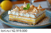 Меренговый пирог. A slice of lemon meringue pie on a blue plate, a delicious baked goods option. Стоковое AI-изображение, AI-художник Katsiaryna Repich / Фотобанк Лори