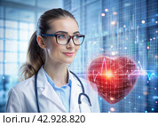 Medicine a young beautiful girl is a cardiologist with glasses in an office with a stethoscope. Red numeric codes in the form of a heart rhythm on a virtual screen. Digital technologies of the future. Стоковое AI-изображение, AI-художник Photojuli / Фотобанк Лори