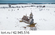 Часовня трех святителей в деревне Немята. Россия, Кенозерский национальный парк. Архангельская область. Март. Стоковое фото, фотограф Сергей Цепек / Фотобанк Лори