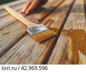 Staining Wood with Brush. Стоковое AI-изображение, AI-художник Кирилл Черезов / Фотобанк Лори