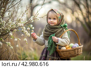 Happy bright Easter. Christianity. Portrait of a three-year-old girl in a Russian folk dress and shawl with a wicker basket with Easter eggs in her hands against a background of a flowering willow. Стоковое AI-изображение, AI-художник Photojuli / Фотобанк Лори