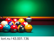 Many colorful billiard balls and cue. Generate Ai. Стоковое AI-изображение, AI-художник Иван Рябоконь / Фотобанк Лори