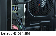 WiFi adapter high gain wireless is connected to blue USB 3.0 port at back of computer system unit. Two antennas greatly extends Wi-Fi range and coverage. Стоковое видео, видеограф Владимир Григорьев / Фотобанк Лори