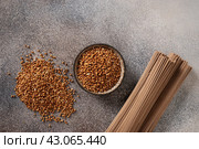 Uncooked buckwheat noodles soba. View from above. Space for text. Стоковое фото, фотограф Светлана Лажко / Фотобанк Лори