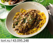 Pork ribs with mushroom sauce and linguine pasta. French cuisine. Стоковое фото, фотограф Яков Филимонов / Фотобанк Лори