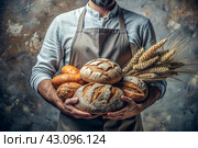 Fresh delicious bread in the hands of a male baker in close-up. Freshly baked sourdough bread with a golden crust on a wooden board. The context of a bakery with delicious bread. Confectionery products. Стоковое AI-изображение, AI-художник Photojuli / Фотобанк Лори