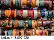 Many vintage colorful bright watch straps for sale. Multicolored background of watch straps. (2017 год). Редакционное фото, фотограф Iva Noel / Фотобанк Лори