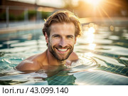 A handsome young man is swimming and practicing in a heated pool, a happy and smiling girl. Recreational water sports. Стоковое AI-изображение, AI-художник Photojuli / Фотобанк Лори