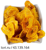 Fried slices of plantains, a traditional and popular snack and accompaniment in Central America. Стоковое фото, фотограф Яков Филимонов / Фотобанк Лори