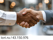 Двое мужчин разной расы пожимают друг другу руки. Стоковое AI-изображение, AI-художник Щеголева Ольга / Фотобанк Лори
