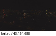 New Year's fireworks in the village. Video from a bird's-eye view of the village on New Year's Eve. Стоковое видео, видеограф Леонид Еремейчук / Фотобанк Лори