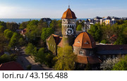 Svetlogorsk, Russia - May 1, 2024: Water tower Rauschen top ariel view. Редакционное фото, фотограф Наталья Симакова / Фотобанк Лори