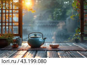 Chinese Ceremony. Brown ceramic pot and brown cup .Green tea on bamboo mat, aged wooden table. Japanese Tea - Hot Teapot And Teacups On Bamboo Mat. Стоковое AI-изображение, AI-художник Ирина Михайличенко / Фотобанк Лори