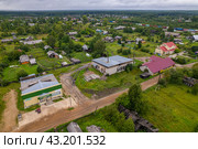 Вид с высоты на магазины в Пинюге (аэросъемка 2023 года) Стоковое фото, фотограф Владислав Самошкин / Фотобанк Лори