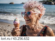 Portrait of an extraordinary, stylish, fashionable elderly woman, a pensioner of 70 years old, with ice cream in her hands on vacation on the beach by the sea. The concept of happy seniors and delicious desserts. Стоковое AI-изображение, AI-художник Photojuli / Фотобанк Лори