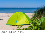 Tourist tent on the sand. Tourist tent on the beach. Hiking with tents in the summer. Стоковое фото, фотограф Zima Nadezhda / Фотобанк Лори