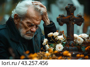Пожилой мужчина у могилы, христианское кладбище, осень. Стоковое AI-изображение, AI-художник Щеголева Ольга / Фотобанк Лори