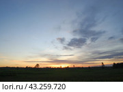 Spring sunset over the field. Стоковое фото, фотограф Andrew_Swarga / Фотобанк Лори