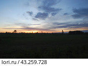 Spring sunset over the field. Стоковое фото, фотограф Andrew_Swarga / Фотобанк Лори