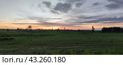 Spring sunset over the field. Стоковое фото, фотограф Andrew_Swarga / Фотобанк Лори