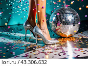 Women's legs in luxurious shiny pumps with heels at a party or disco on the background of a silver mirrored disco ball. The queen of the dance floor. Стоковое AI-изображение, AI-художник Photojuli / Фотобанк Лори